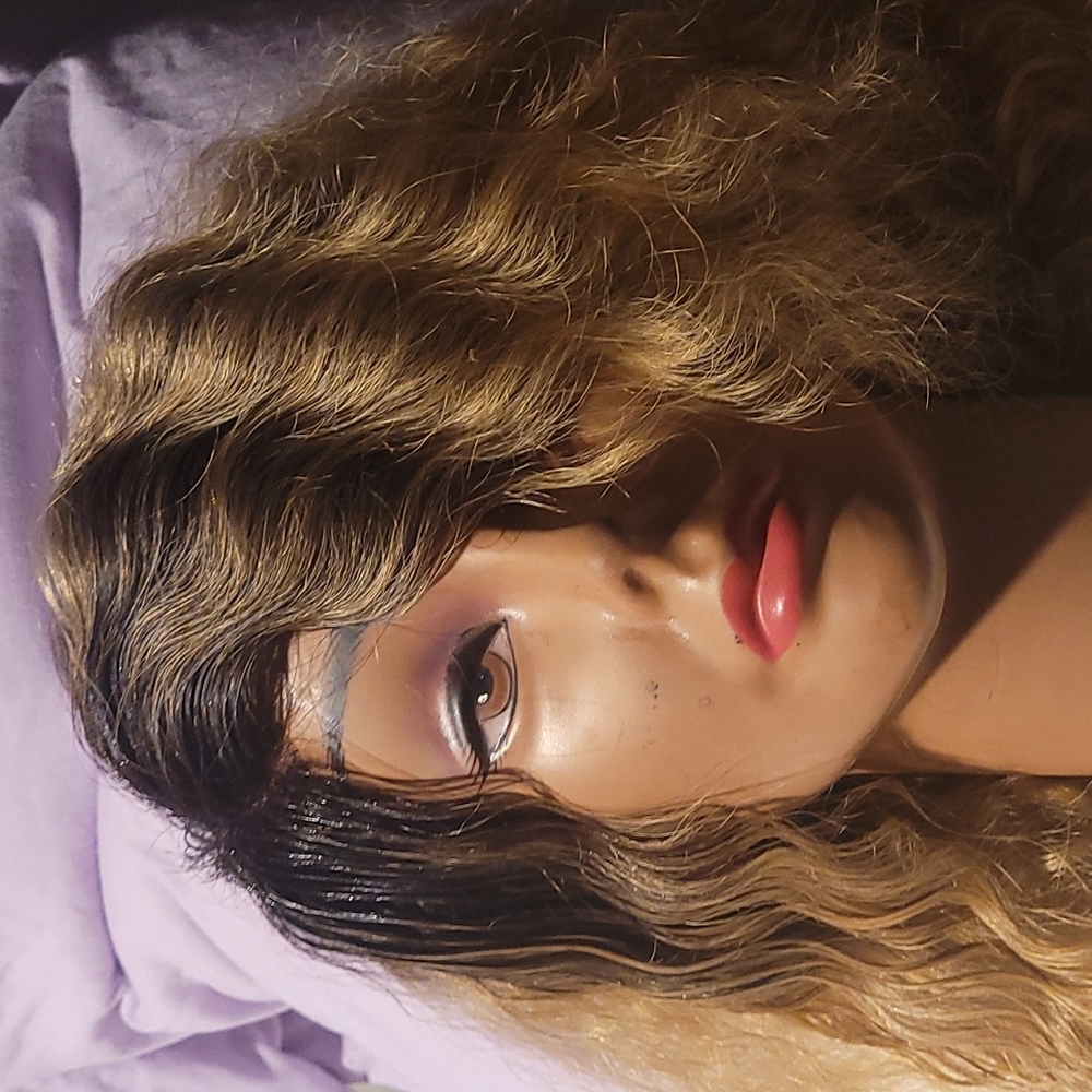 100% Remy Human Hair wig. 16" with layers.  body and bounce. I